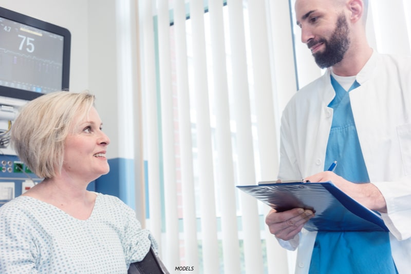 Female patient with doctor